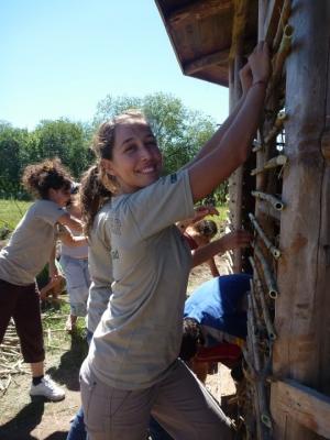 Volunteer Paints a School during a Service Trip in Argentina with Projects Abroad Volunteer plaints a building on a service trip in Argentina