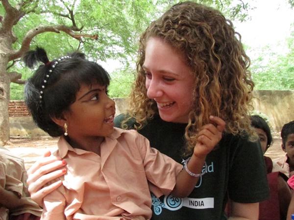 Volunteer Spends Time with Child on Care Project in India A Projects Abroad volunteer spends time with a child at a Care placement in India.