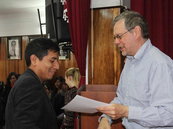 Local teacher receiving his certificate signed by the Regional Director of Education in Peru saying he completed the Teacher Training Local teacher receiving his certificate signed by the Regional Director of Education in Peru saying he completed the Teacher Training
