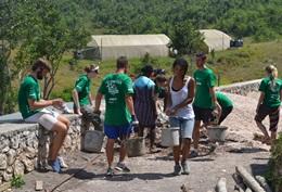 Building Volunteers build safer and cleaner bathroom facilities at a school in Jamaica.