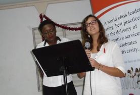 Care A volunteer gives a presentation about preventing HIV and AIDS in Jamaica.
