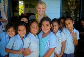 Samoa A Care & Community Village Project High School Special volunteer with her students in Samoa.