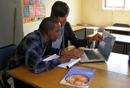 Intern on the Business Project Working Closely with Staff Business intern works on a business plan overseas with Projects Abroad