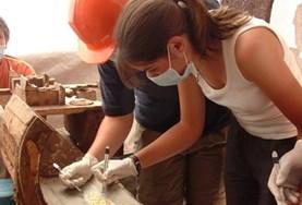 Archaeology Volunteer Conducting Fieldwork Abroad Volunteer on the Archaeology project observes findings with Projects Abroad
