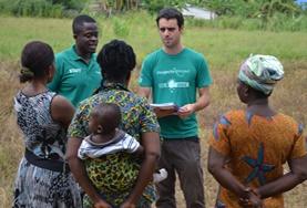 Microfinance A microfinance intern volunteer gives local business women advice during his project in Ghana.