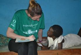 Internships for <br /> Social Work Students In Ghana, a Social Work Intern speaks to a young girl at her placement.