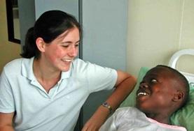 Medicine & Healthcare A student on her dentistry internship in Ghana sits with a patient.