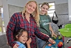 Medicine & Healthcare Nutrition volunteers in Bolivia prepare delicious and healthy meals for children.