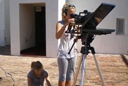 Journalism In Jamaica, a professional journalist films a segment as part of her volunteering journalism trip.