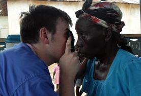 Medicine & Healthcare A professional nurse teaches a woman different breastfeeding techniques in Ghana, Africa.
