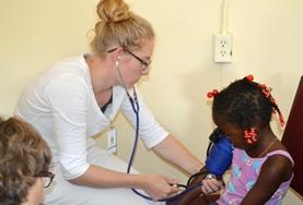 Medicine & Healthcare Volunteer nurses with their patients in Jamaica.