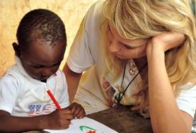 Medicine & Healthcare A professional volunteer occupational therapist gives children in Ghana a creative activity to complete as part of their treatment.