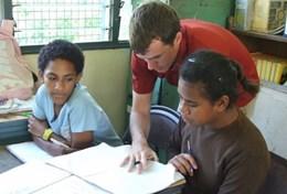 Fiji A speech therapist volunteering in Fiji works with school children.