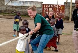 Teaching A special needs teacher volunteering in Ghana spends time outdoors with local children.