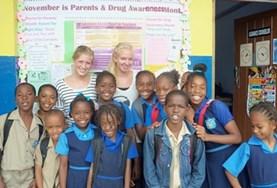 Teaching Students and volunteers after a computer skills class in Jamaica.