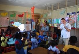 Teaching A volunteer leads a French language class at a school in Jamaica.