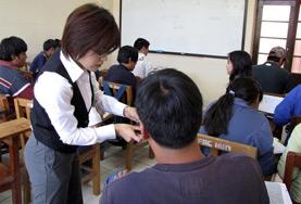 Teaching A Teaching volunteer works with her student in Bolivia.